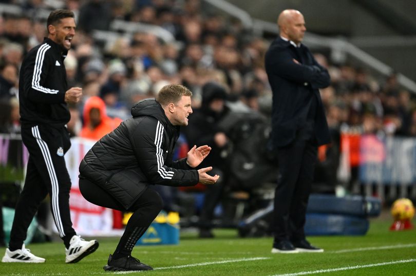 NEWCASTLE UPON TYNE, ENGLAND - DECEMBER 04: Eddie Howe, Manager of Newcastle United, reacts as Arne Slot, Manager of Liverpool, looks on during the Premier League match between Newcastle United FC and Liverpool FC at St James' Park on December 04, 2024 in Newcastle upon Tyne, England. (Photo by Stu Forster/Getty Images)