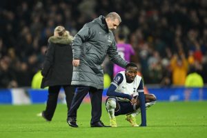 Ange Postecoglou consoles Pape Matar Sarr after the draw in the Premier League match between Tottenham Hotspur and Wolverhampton Wanderers